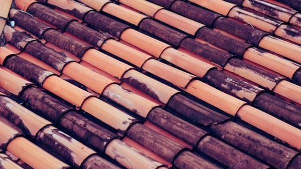 Clay tile roof in California showing Spanish barrel-style roofing