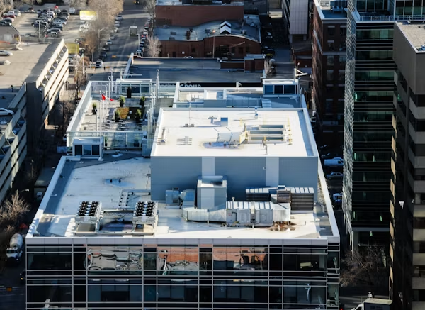 Commercial flat roofing in California with reflective TPO membrane